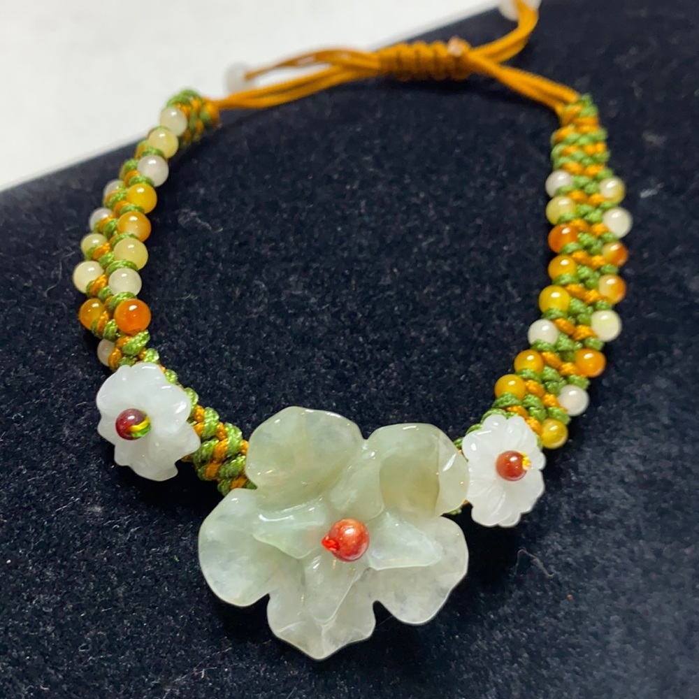 Woven adjustable carved jade flower bracelet